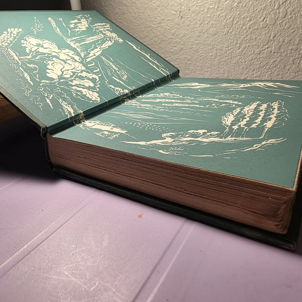 Green Hardcover Book with Gold Design